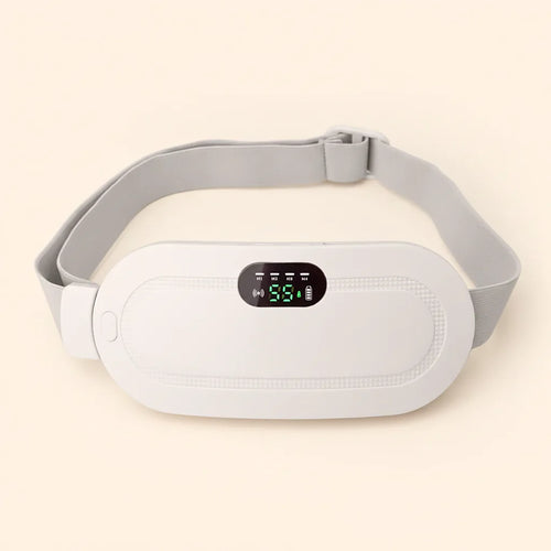 The white pad of the pair: a cordless heated pad with a green display, three buttons and a USB-C port along one edge, and a soft grey adjustable strap.